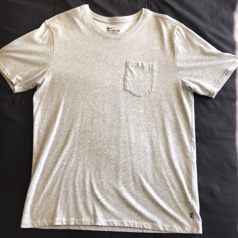 The Nike Tee. Dri-fit breast pocket shirt